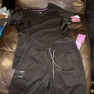 Women black Scrubs- both medium sized.